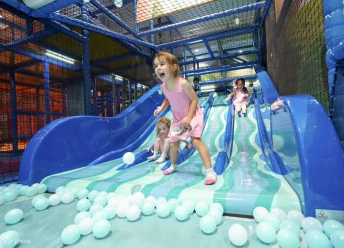 Children engaging with interactive science exhibits